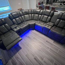 POWER RECLINING SECTIONAL SOFA WITH SPEAKERS,  LED LIGHTS,  USB PORTS, CUPHOLDERS AND ARM STORAGE 