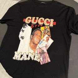 This is a Gucci Mane "Gucci Collage" black t-shirt. 