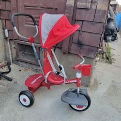Radio Flyer Stroller Tricycle, EZ Fold 4-in-1 Stroll 'N Trike for Infant & Toddler, Red