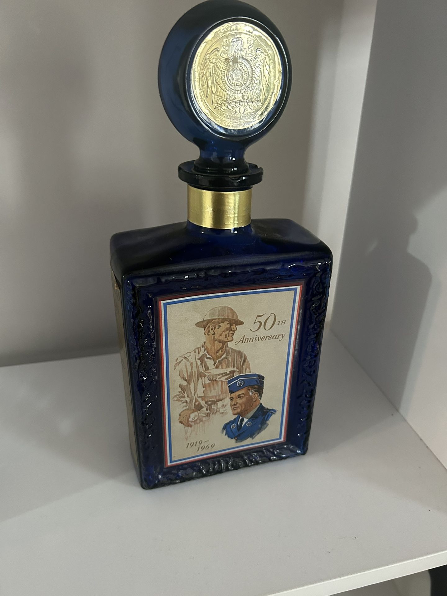VINTAGE BLUE 1(contact info removed) J.W. DANT AMERICAN LEGION 50TH ANNIVERSARY DECANTER Empty