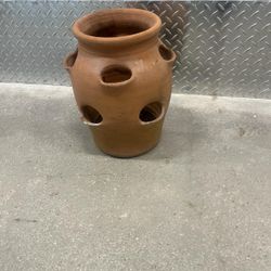 Greek style terra-cotta pot with a hole in the bottom. 13” high ,8” high $35