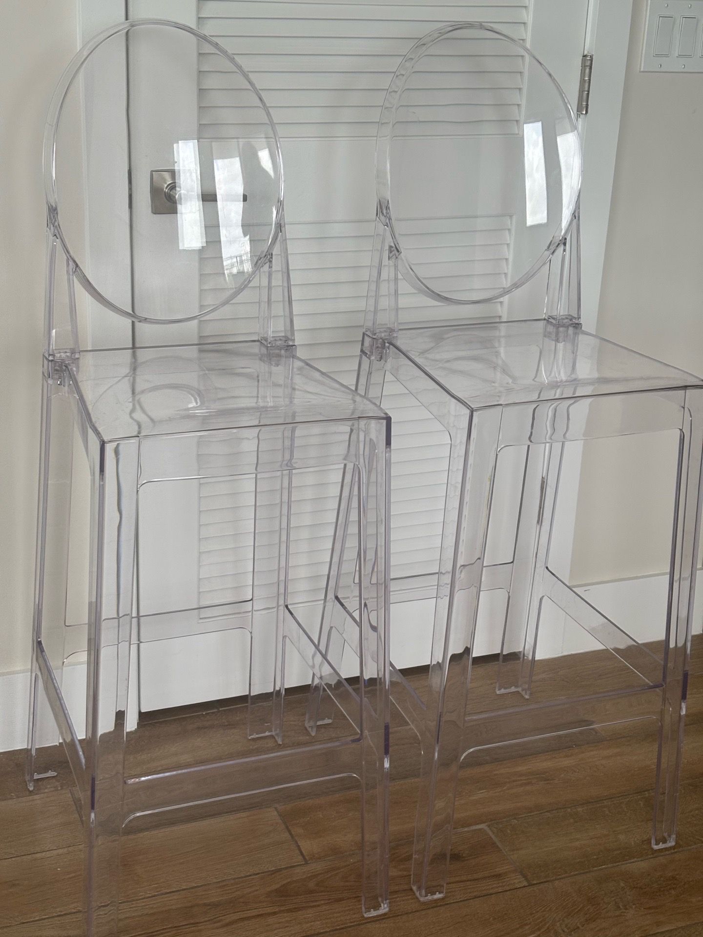 2 clear bar stools