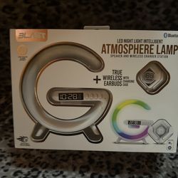 LED Light With Wireless Charging And Earbuds