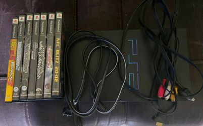 PlayStation 2 Console with 7 Games and Cables