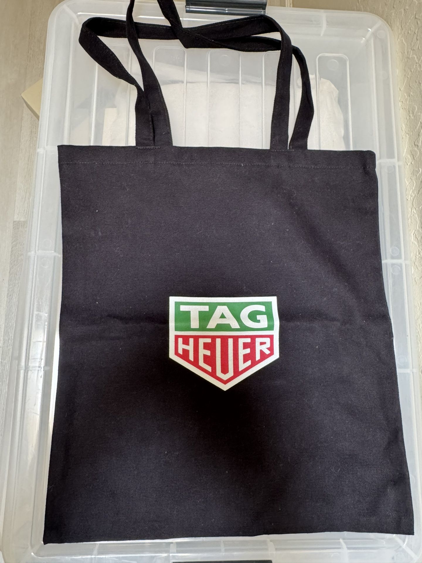 Tag Heuer Tote 14”x16”. Total Length From Handle 27”al- Brand New