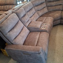 Upholstered Powered Sectional With Console