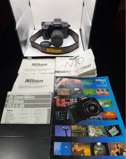 Nikon SLR Film Camera with AF Nikkor 28-80mm Lens with Manuals
