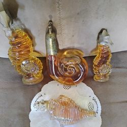4 Vintage Collectible Avon Decanter Bottles
