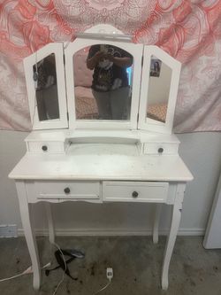 All white vanity, desk, and mirror