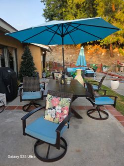 Outdoor table chairs & umbrella