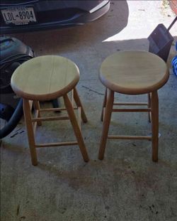 2 solid wood stools