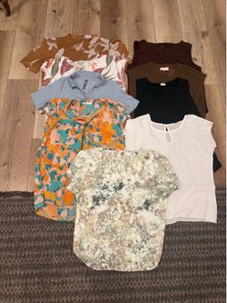 a set of women's blouses, size L