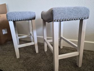 2 counter height saddle stools