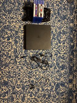 Sony PlayStation 4 Original Black, 500GB with 2 Controllers, Cables, 6 Games
