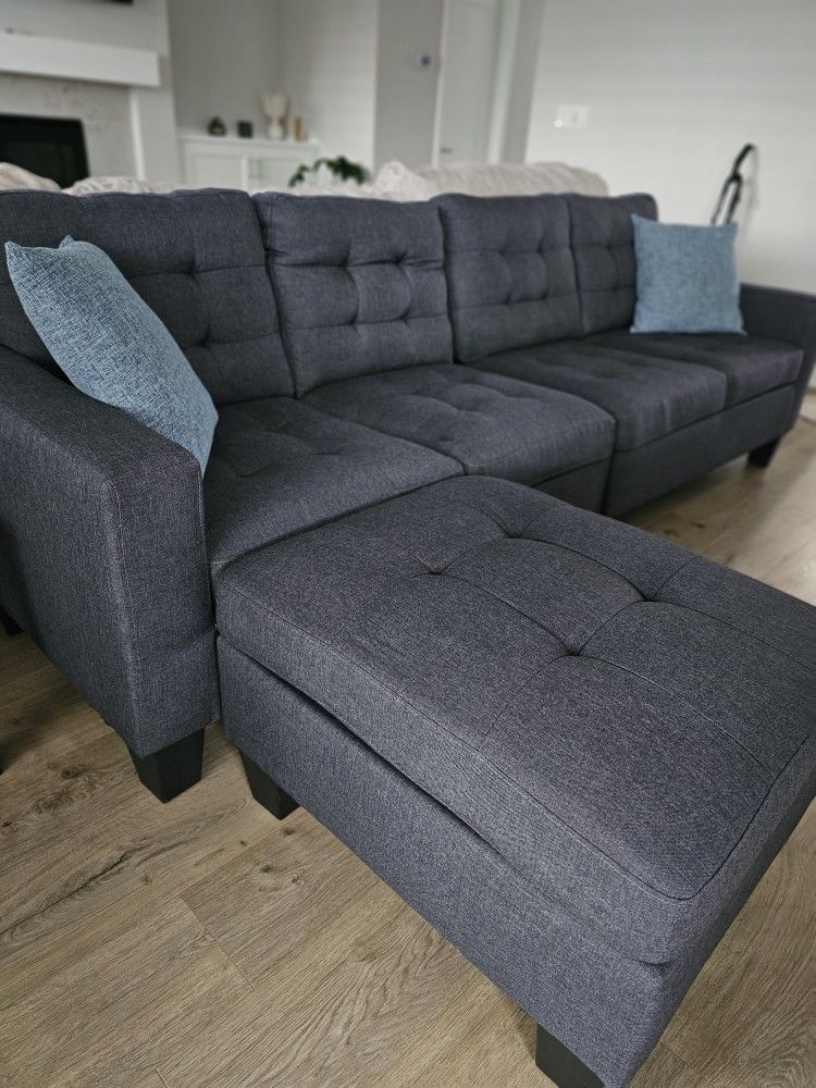 beautiful sofa with pouf