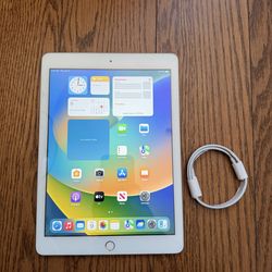 iPad 5th Gen 128GB Gold with charging cable