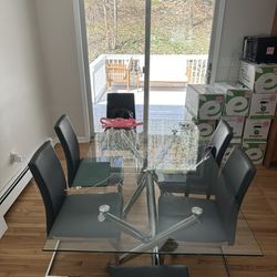 Glass Table And 6 Chairs 