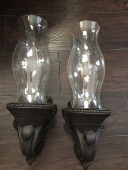 Glass and iron candle holders hanging
