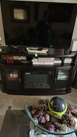 Entertainment/TV Stand With Fire Place.