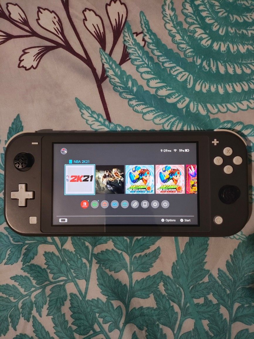 Nintendo Switch Lite Console With 2K21 And a 128G Micro SD Card.