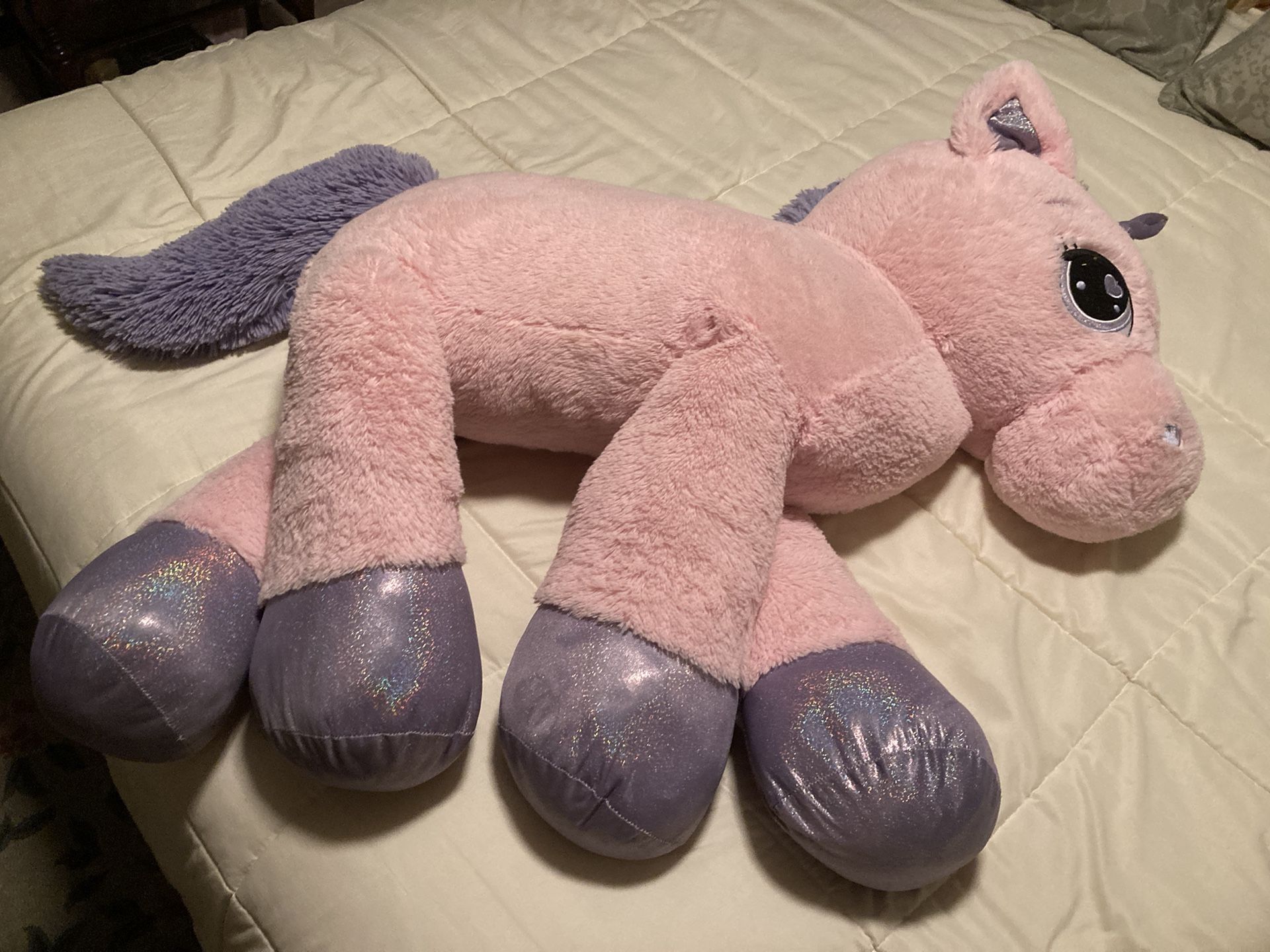 Pink unicorn stuffed animal