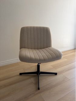 Beige Swivel Desk Chair – $40