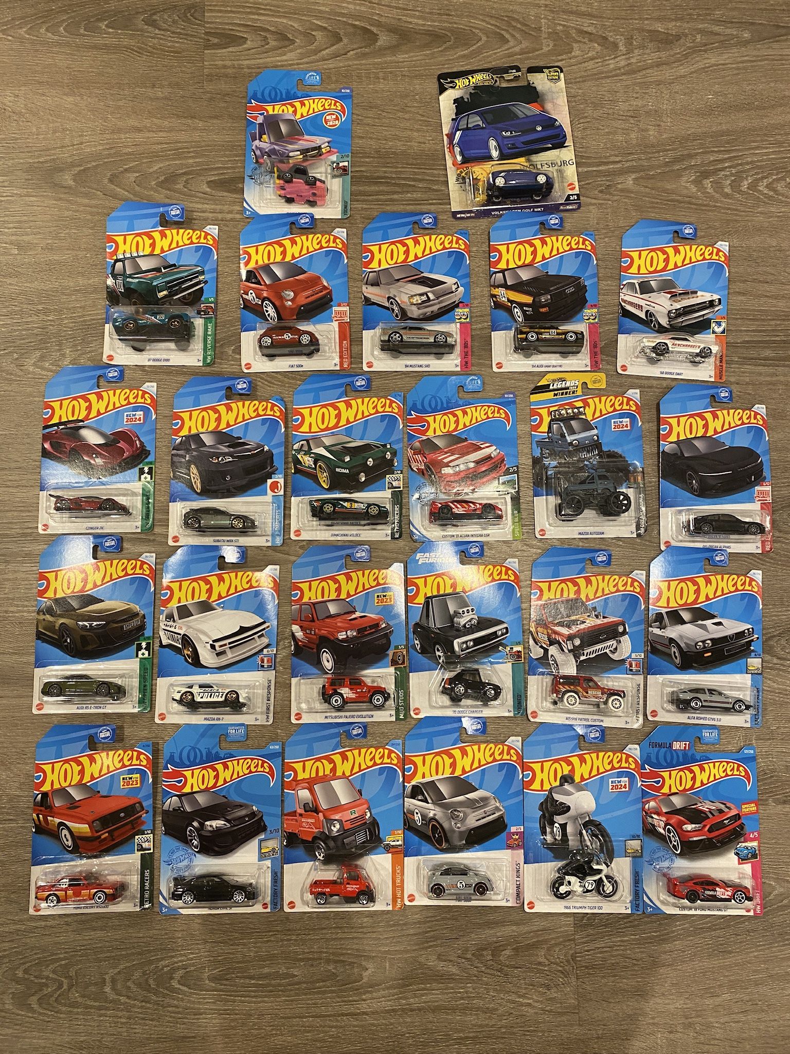 (24) Hot Wheels Cars / Trucks New In Blister Packs
