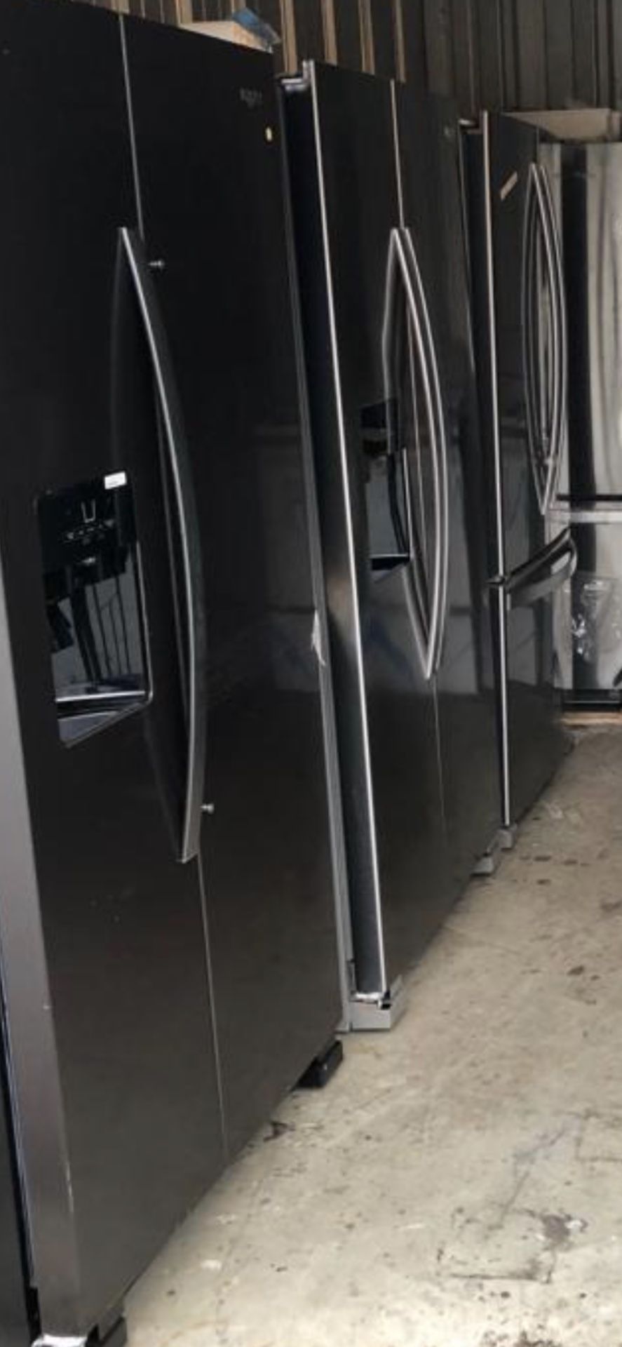 Brand new out the box side by side fridges