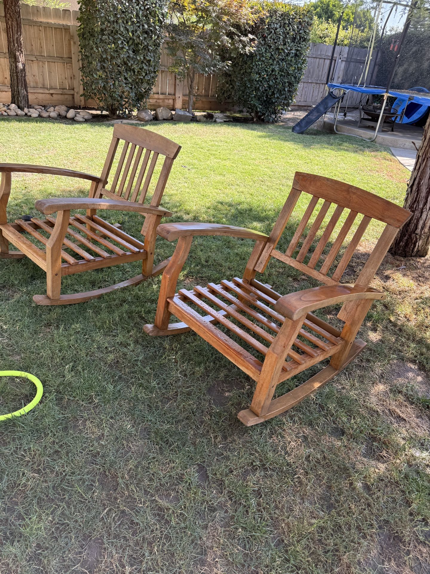 2 Lg teak Rocking Chairs