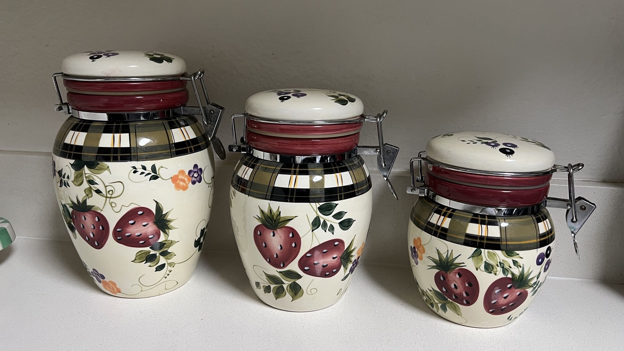 Hand painted strawberry canisters