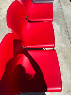 One dozen pastic chairs $100 dollars
