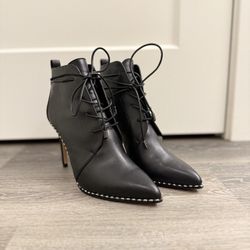 Black leather lace-up ankle boots
