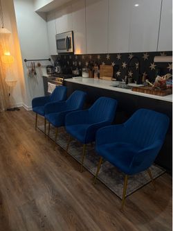 Four Blue Velvet Dining Chairs