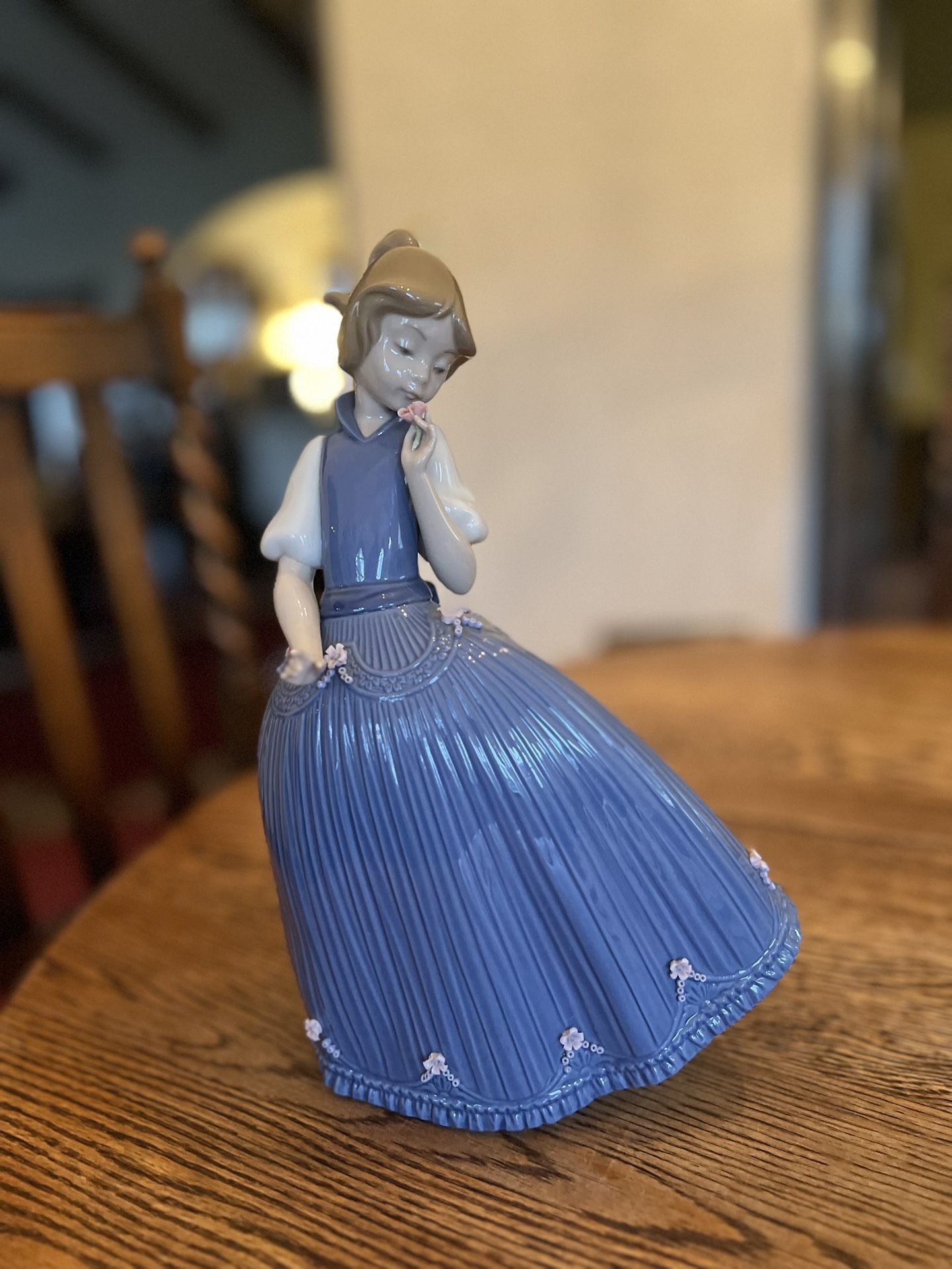 Lladro - Girl In Blue Dress With Flowers 11 1/2"h by 8" wide 