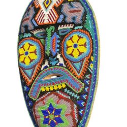 Description: Authentic Huichol (Wixárika) beaded mask, approx. 10 inches tall. Hand-carved wood base with beeswax and thousands of colorful glass seed