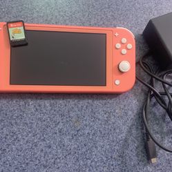 Nintendo Switch Lite + Animal Crossing New Horizons + Charger