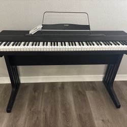 Casio keyboard  and storage Bench