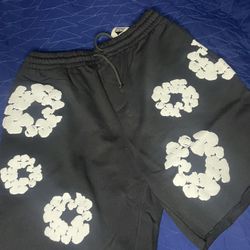 black denim tear shorts 