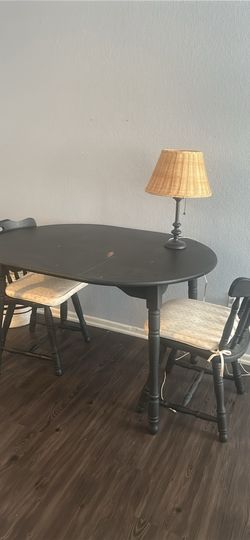 Hard wood dining room table set (3 chairs)