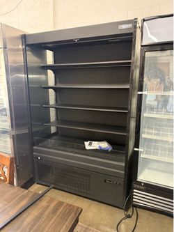 59" Black Vertical Air Curtain Merchandiser with 22.2 cu. ft. Volume