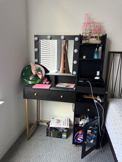 black and gold desk with vanity
