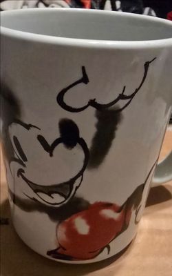 This is a white ceramic Zak Designs Disney Mickey Mouse "Oh Yeah