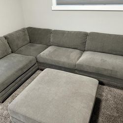 Like  New-Costco Penelope  Section With Ottoman Sofa