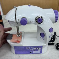 Sewing machine small