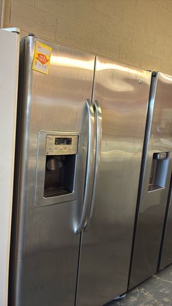 Like new GE side by side refrigerator