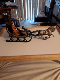Antique sleigh cast iron, 14 inches long, great shape. Might be reproduction don't really know