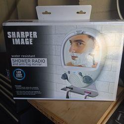 Sharper image mirror shaving radio