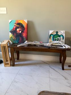 Wooden bench by doorway