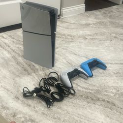 Barely Used Playstation Five. With an extra Blue Controller.