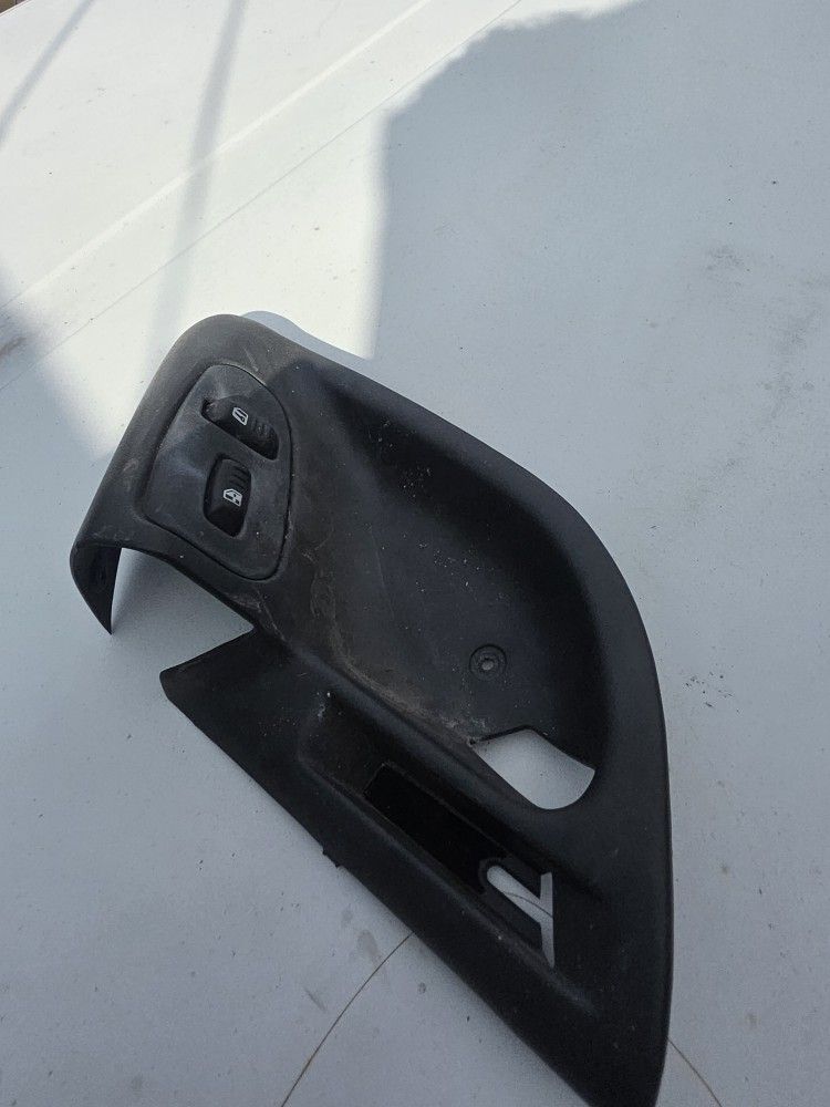 Passenger Side Interior door handle bezel for a 93-02 Chevy Camaro